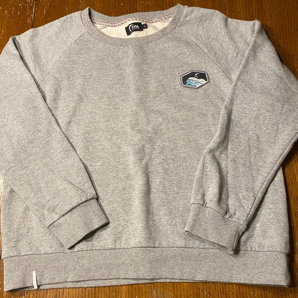 Zyia sweatshirt size Large. Like New condition